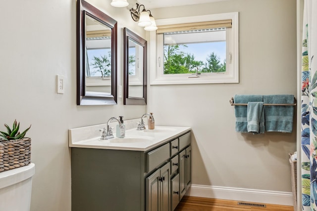 183 Summer St, Newport, NH 03773 - full bath with double vanity and wood finished floors