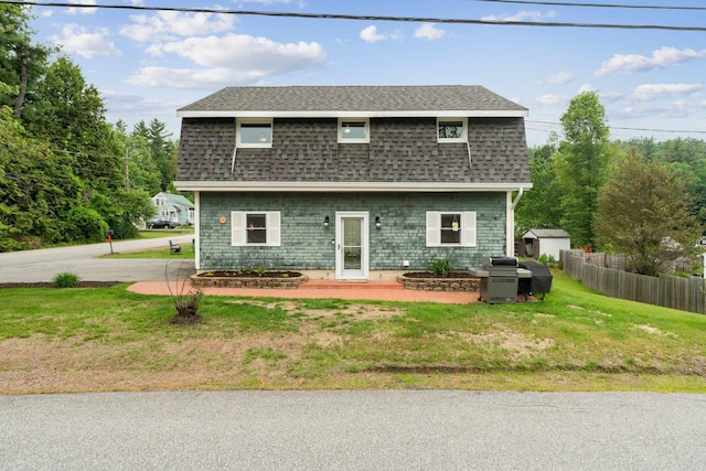 183 Summer St, Newport, NH 03773 - back of property featuring roof with shingles and a storage shed