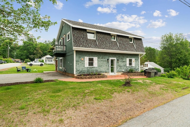 183 Summer St, Newport, NH 03773 - rear view of house featuring roof with shingles, a yard, and a balcony
