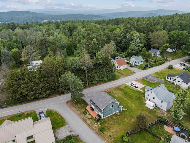 183 Summer St, Newport, NH 03773 - aerial view of residential area with a forest and a mountainous background