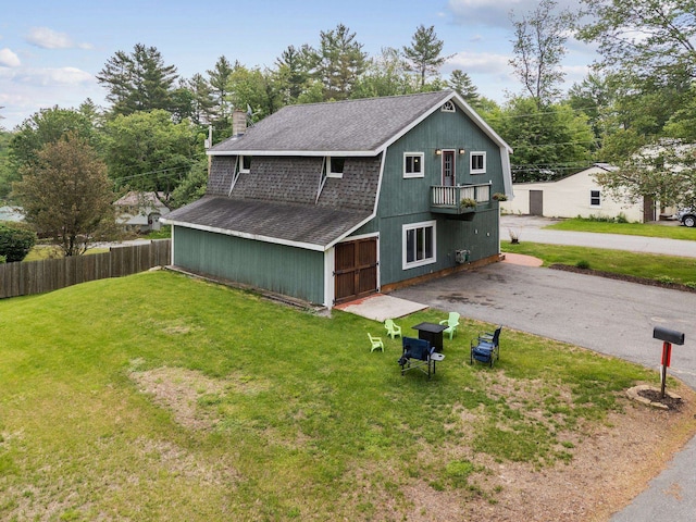 183 Summer St, Newport, NH 03773 - rear view of house featuring roof with shingles and a chimney