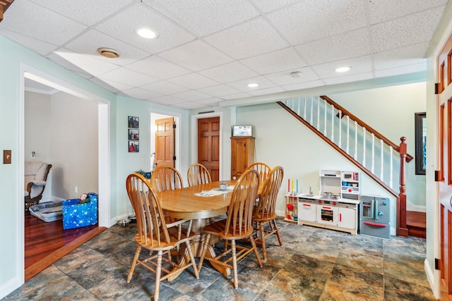 183 Summer St, Newport, NH 03773 - dining area with a drop ceiling, stairs, stone finish flooring, and recessed lighting