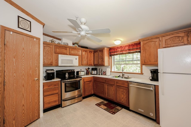 44 Hoit Mill Rd, Weare, NH 03281 - kitchen with appliances with stainless steel finishes, light countertops, a ceiling fan, brown cabinets, and crown molding
