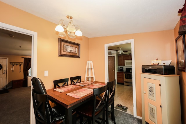44 Hoit Mill Rd, Weare, NH 03281 - carpeted dining space with a chandelier and a ceiling fan