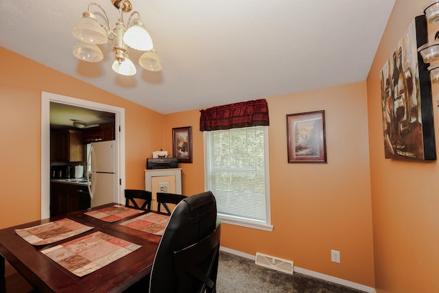 44 Hoit Mill Rd, Weare, NH 03281 - dining space featuring a chandelier and dark carpet