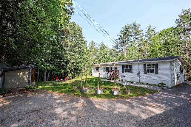 44 Hoit Mill Rd, Weare, NH 03281 - view of front of home featuring a front yard and view of wooded area
