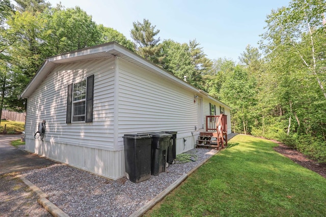 44 Hoit Mill Rd, Weare, NH 03281 - view of side of property featuring a yard