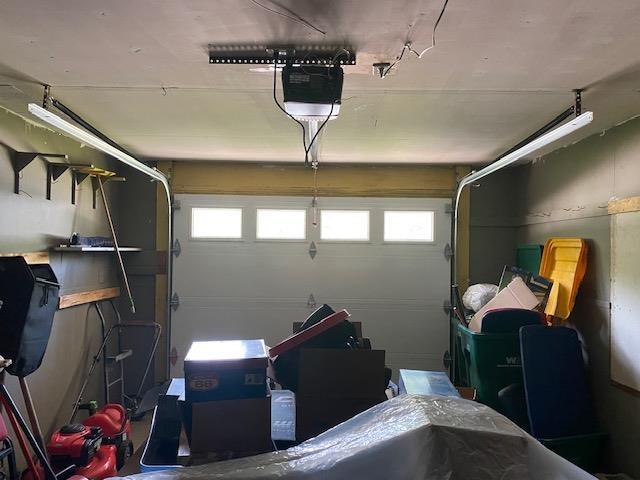 15 Vernon Ave, Rochester, NH 03867 - garage with a garage door opener