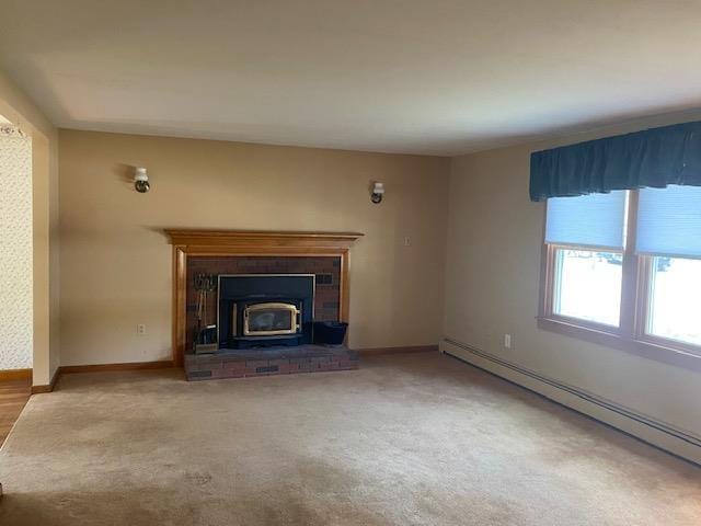 15 Vernon Ave, Rochester, NH 03867 - unfurnished living room featuring a baseboard radiator and carpet flooring