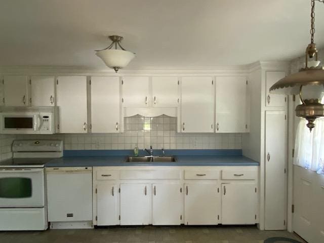 15 Vernon Ave, Rochester, NH 03867 - kitchen with white appliances, white cabinets, dark countertops, and tasteful backsplash