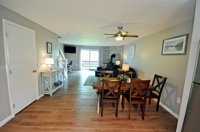 17 Village W Dr Unit 11, Bristol, NH 03222 - dining room with ceiling fan and wood finished floors