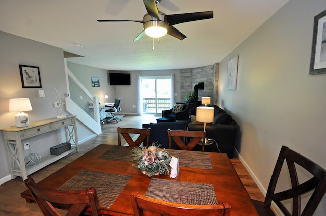 17 Village W Dr Unit 11, Bristol, NH 03222 - dining space featuring ceiling fan, wood finished floors, and a desk