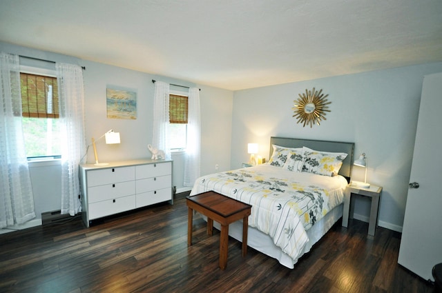 17 Village W Dr Unit 11, Bristol, NH 03222 - bedroom featuring dark wood-type flooring and multiple windows