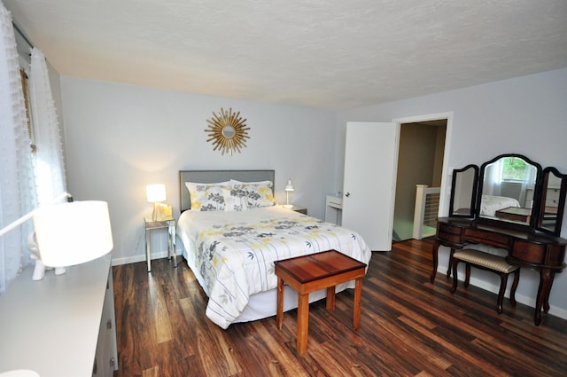 17 Village W Dr Unit 11, Bristol, NH 03222 - bedroom with dark wood finished floors and baseboards