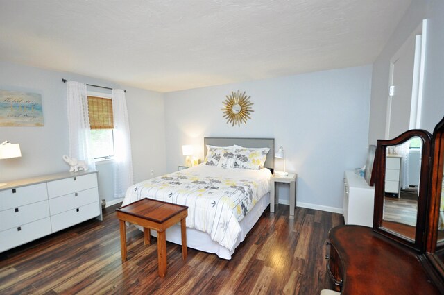 17 Village W Dr Unit 11, Bristol, NH 03222 - bedroom with dark wood-type flooring and baseboards