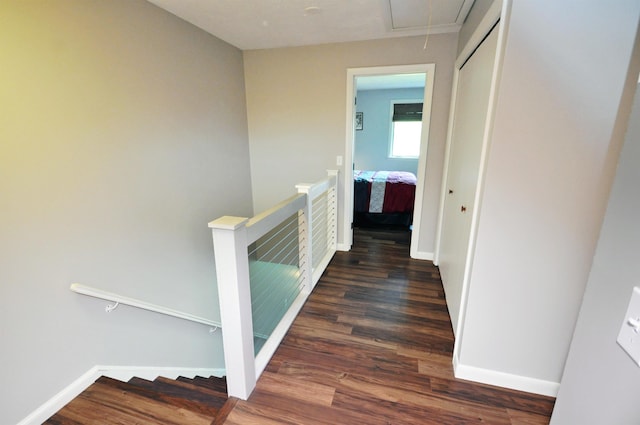 17 Village W Dr Unit 11, Bristol, NH 03222 - corridor with an upstairs landing, attic access, and wood finished floors