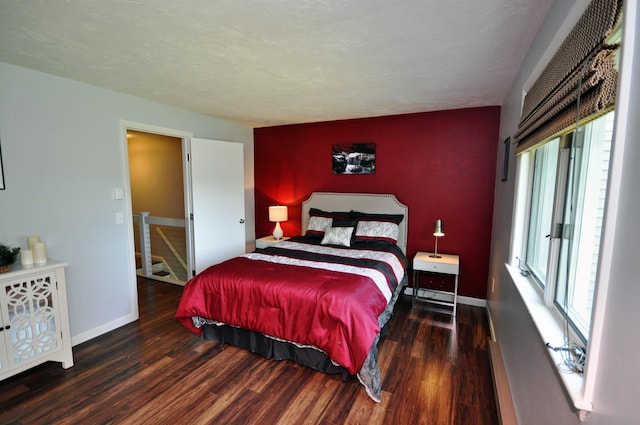 17 Village W Dr Unit 11, Bristol, NH 03222 - bedroom with an accent wall and wood finished floors
