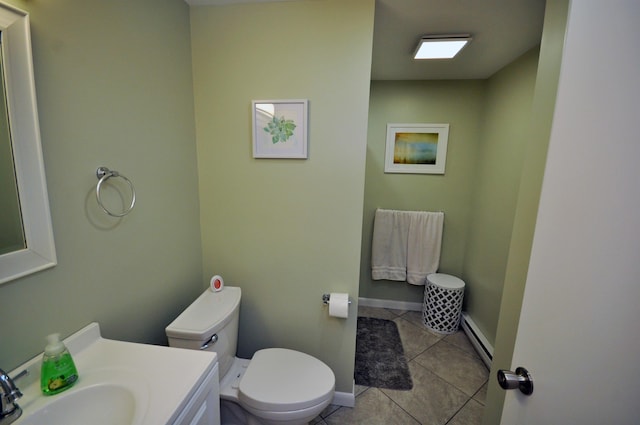 17 Village W Dr Unit 11, Bristol, NH 03222 - bathroom with a baseboard radiator, tile patterned flooring, and vanity