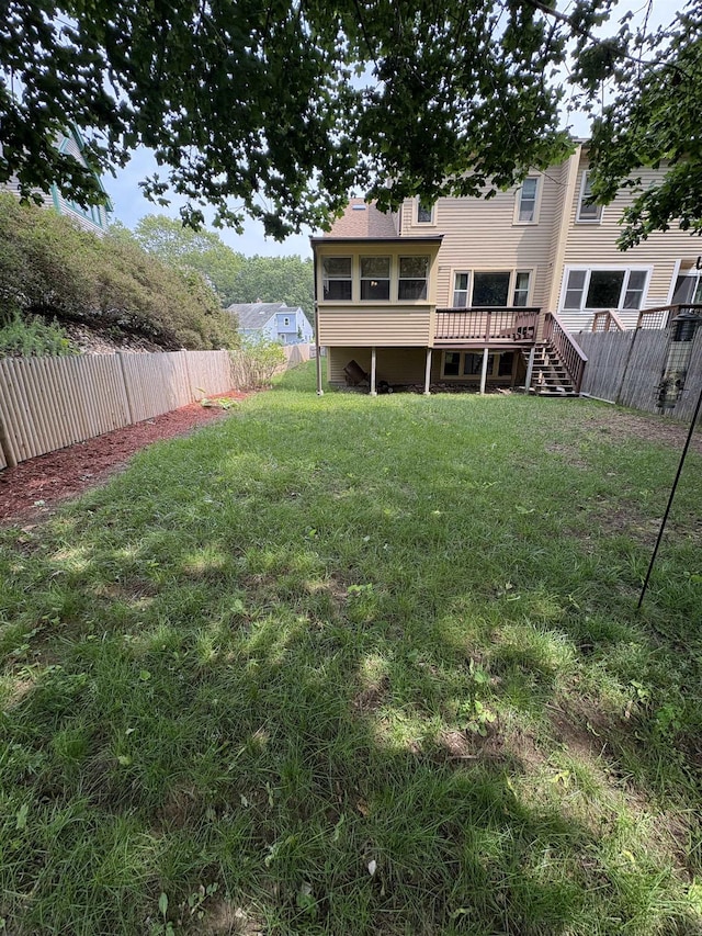 71 Esker Rd Unit B, Hampton, NH 03842 - fenced backyard featuring a wooden deck and stairs