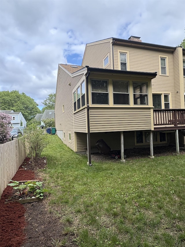 71 Esker Rd Unit B, Hampton, NH 03842 - back of property featuring a chimney and a deck