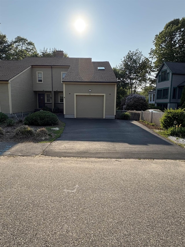 71 Esker Rd Unit B, Hampton, NH 03842 - view of front of home with driveway and a garage