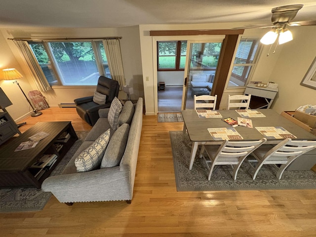 71 Esker Rd Unit B, Hampton, NH 03842 - living area with healthy amount of natural light, a ceiling fan, and wood finished floors