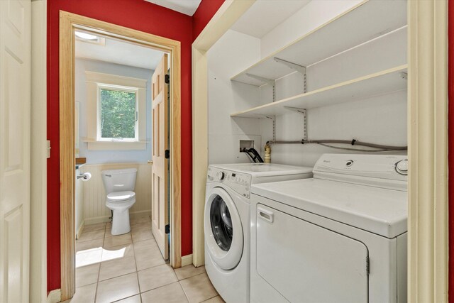 592 Old Bristol Rd, New Hampton, NH 03256 - laundry area with separate washer and dryer and light tile patterned floors