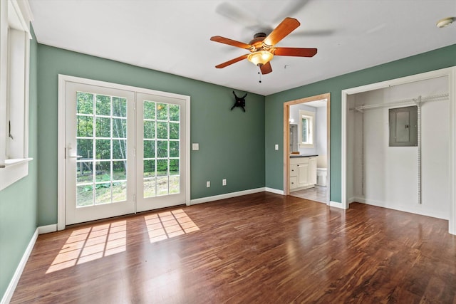 592 Old Bristol Rd, New Hampton, NH 03256 - unfurnished bedroom with electric panel, wood finished floors, ensuite bathroom, and ceiling fan