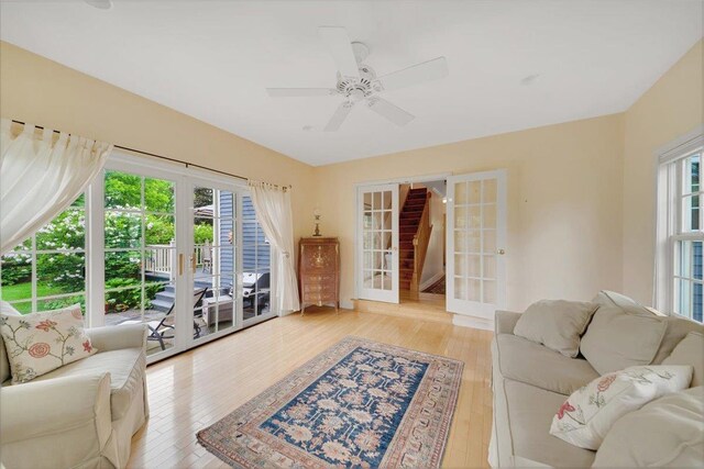 236 Lefebvre Ln, Williston, VT 05495 - living room with french doors, light wood-style flooring, and ceiling fan