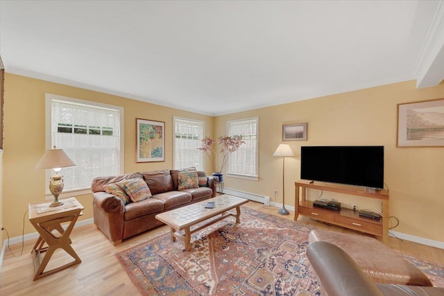 236 Lefebvre Ln, Williston, VT 05495 - living area featuring a baseboard heating unit, crown molding, and light wood-style floors