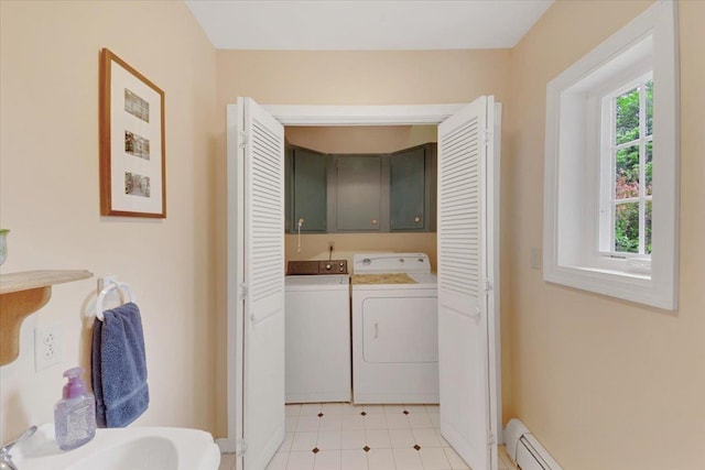 236 Lefebvre Ln, Williston, VT 05495 - washroom with washing machine and dryer, cabinet space, and a baseboard radiator