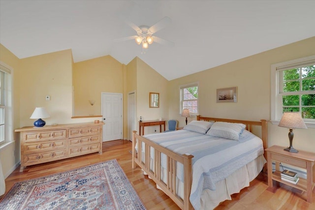 236 Lefebvre Ln, Williston, VT 05495 - bedroom with multiple windows, light wood-type flooring, lofted ceiling, and a ceiling fan