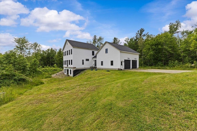 27 Hidden View Rd, Underhill, VT 05489 - view of home's exterior with a garage, driveway, and a yard