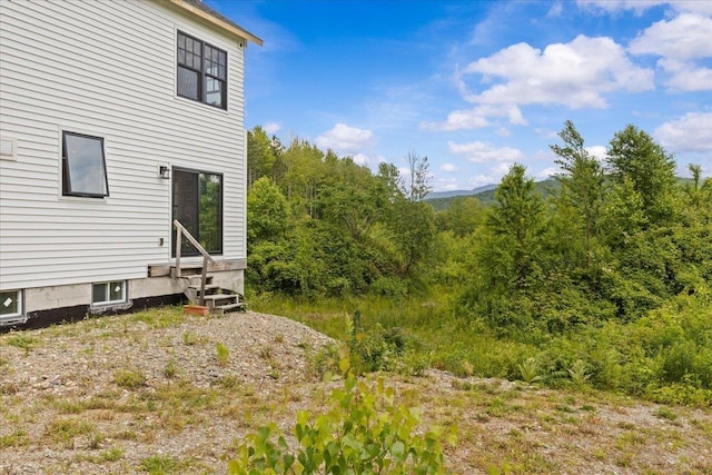 27 Hidden View Rd, Underhill, VT 05489 - view of yard featuring entry steps and a view of trees