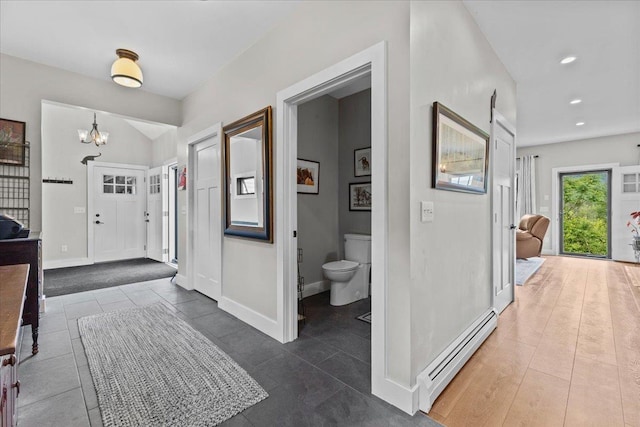 27 Hidden View Rd, Underhill, VT 05489 - hall with a baseboard radiator, a chandelier, tile patterned floors, and recessed lighting