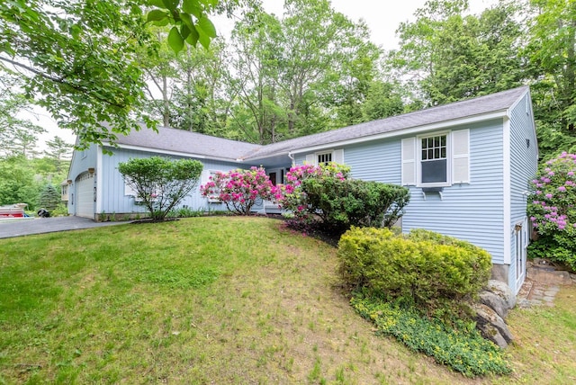 11 Penny Ln, Laconia, NH 03246 - single story home with an attached garage, a front yard, and asphalt driveway