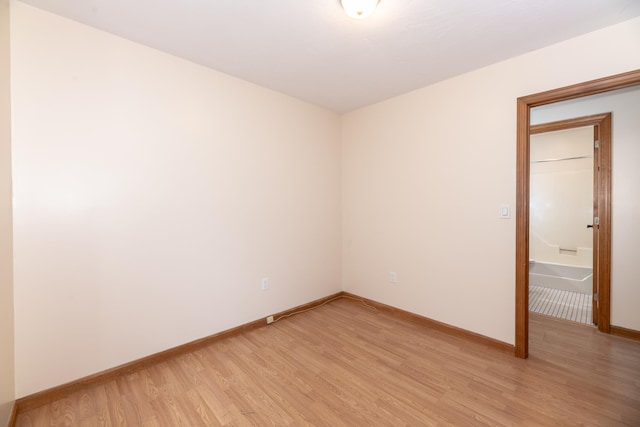 11 Penny Ln, Laconia, NH 03246 - spare room featuring light wood-style floors and baseboards