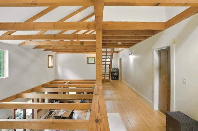 130A Amherst St, Amherst, NH 03031 - stairway featuring hardwood / wood-style floors and baseboards