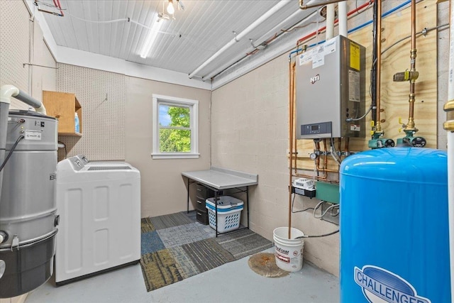 564 St Albans Rd, Swanton, VT 05488 - laundry area with separate washer and dryer, water heater, and concrete block wall