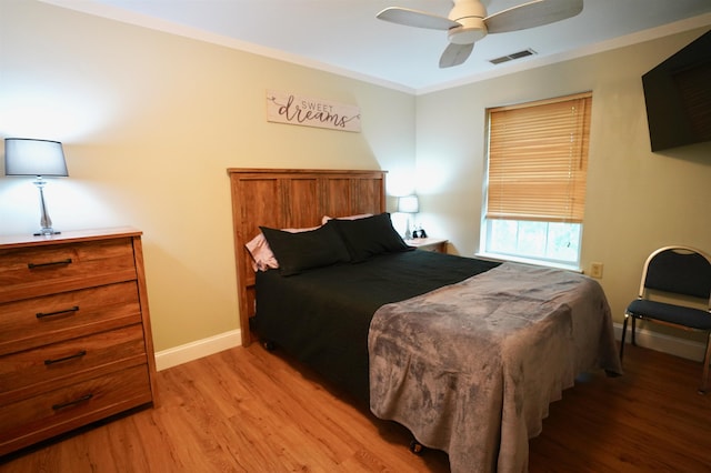89 Eastern Ave Unit 306, Manchester, NH 03104 - bedroom with light wood finished floors, ceiling fan, and crown molding