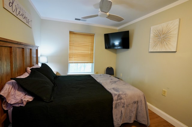 89 Eastern Ave Unit 306, Manchester, NH 03104 - bedroom featuring wood finished floors, crown molding, and a ceiling fan