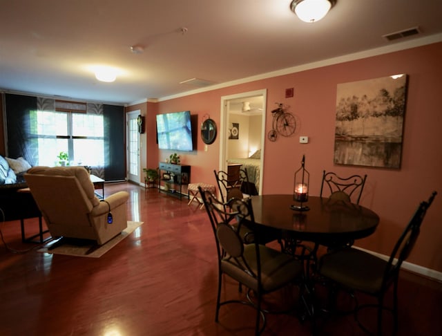 89 Eastern Ave Unit 306, Manchester, NH 03104 - dining room featuring wood finished floors and crown molding