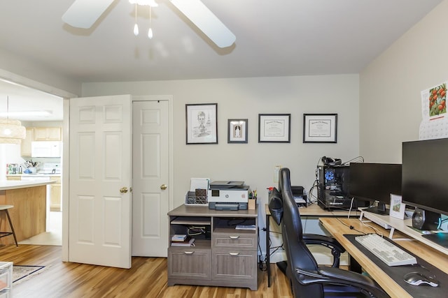4 Crestview Cir Unit 106, Londonderry, NH 03053 - office area featuring light wood finished floors and a ceiling fan