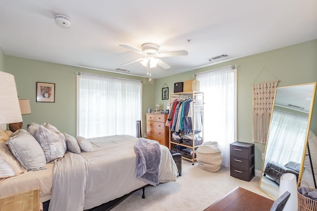 4 Crestview Cir Unit 106, Londonderry, NH 03053 - carpeted bedroom featuring multiple windows and ceiling fan