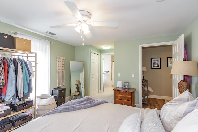 4 Crestview Cir Unit 106, Londonderry, NH 03053 - bedroom with a ceiling fan, a closet, and wood finished floors