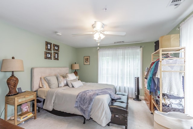 4 Crestview Cir Unit 106, Londonderry, NH 03053 - bedroom with light carpet and a ceiling fan