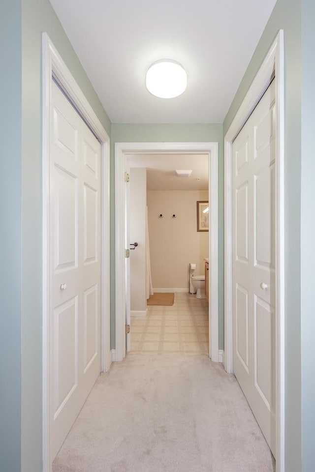 4 Crestview Cir Unit 106, Londonderry, NH 03053 - corridor with baseboards and light colored carpet