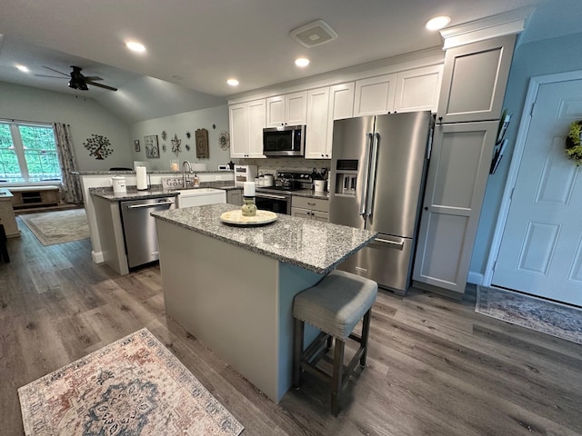 326 Dublin Rd, Jaffrey, NH 03452 - kitchen with appliances with stainless steel finishes, a peninsula, ceiling fan, lofted ceiling, and a kitchen island