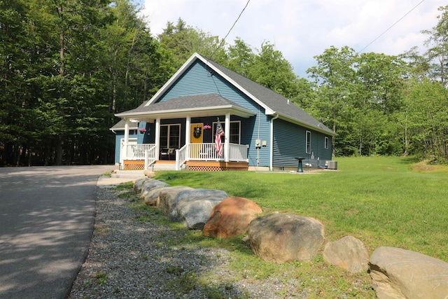 326 Dublin Rd, Jaffrey, NH 03452 - view of front of property featuring covered porch, a front lawn, and roof with shingles