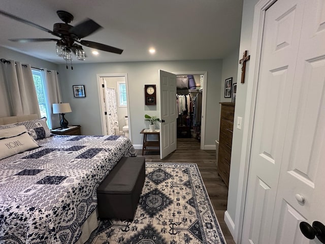 326 Dublin Rd, Jaffrey, NH 03452 - bedroom featuring wood finished floors, a spacious closet, recessed lighting, a closet, and ensuite bath